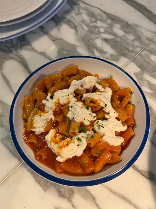 Rigatoni alla pomodoro topped with stracciatella
